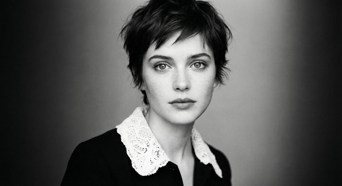 Monochrome cinematic portrait of a young woman — output 1