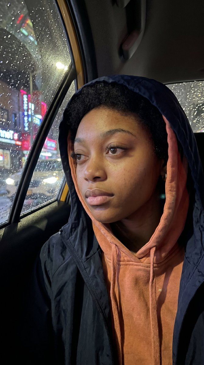 Profile / Avatar - Realistic iPhone Photo Rainy Taxi Night — output 1