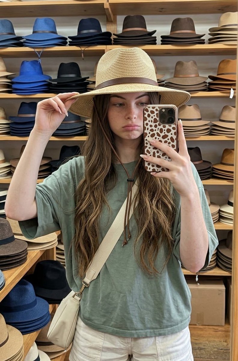 Profile / Avatar - Hat Shop Selfie Portrait Prompt — output 1