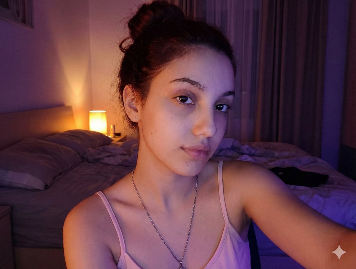 Profile / Avatar - Intimate Low-Light Bedroom Selfie (Chiaroscuro) — output 1