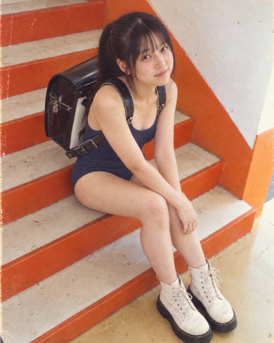 Social Media Post - Girl in Swimsuit on Orange Stairs — output 1