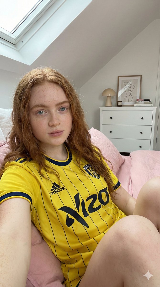 Photorealistic Selfie of Sadie Sink in a Soccer Jersey — output 1