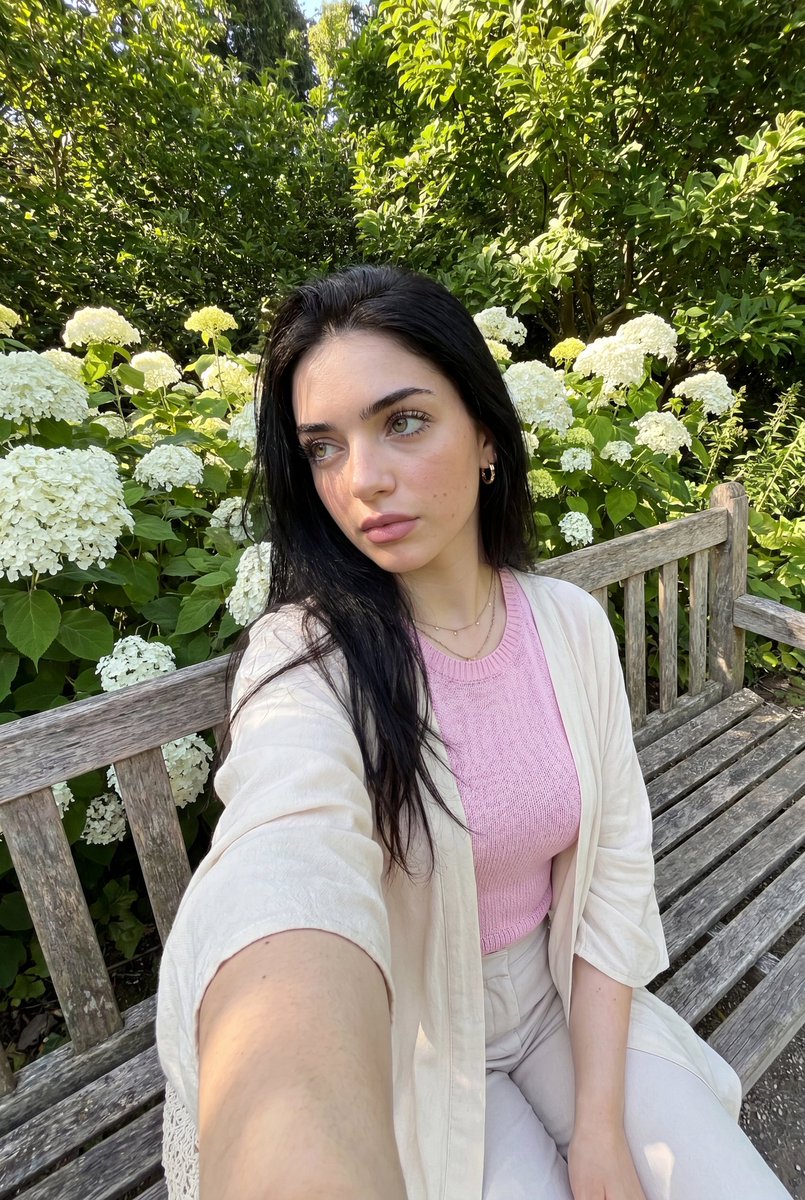 Profile / Avatar - Realistic iPhone Selfie in Botanical Garden — output 1