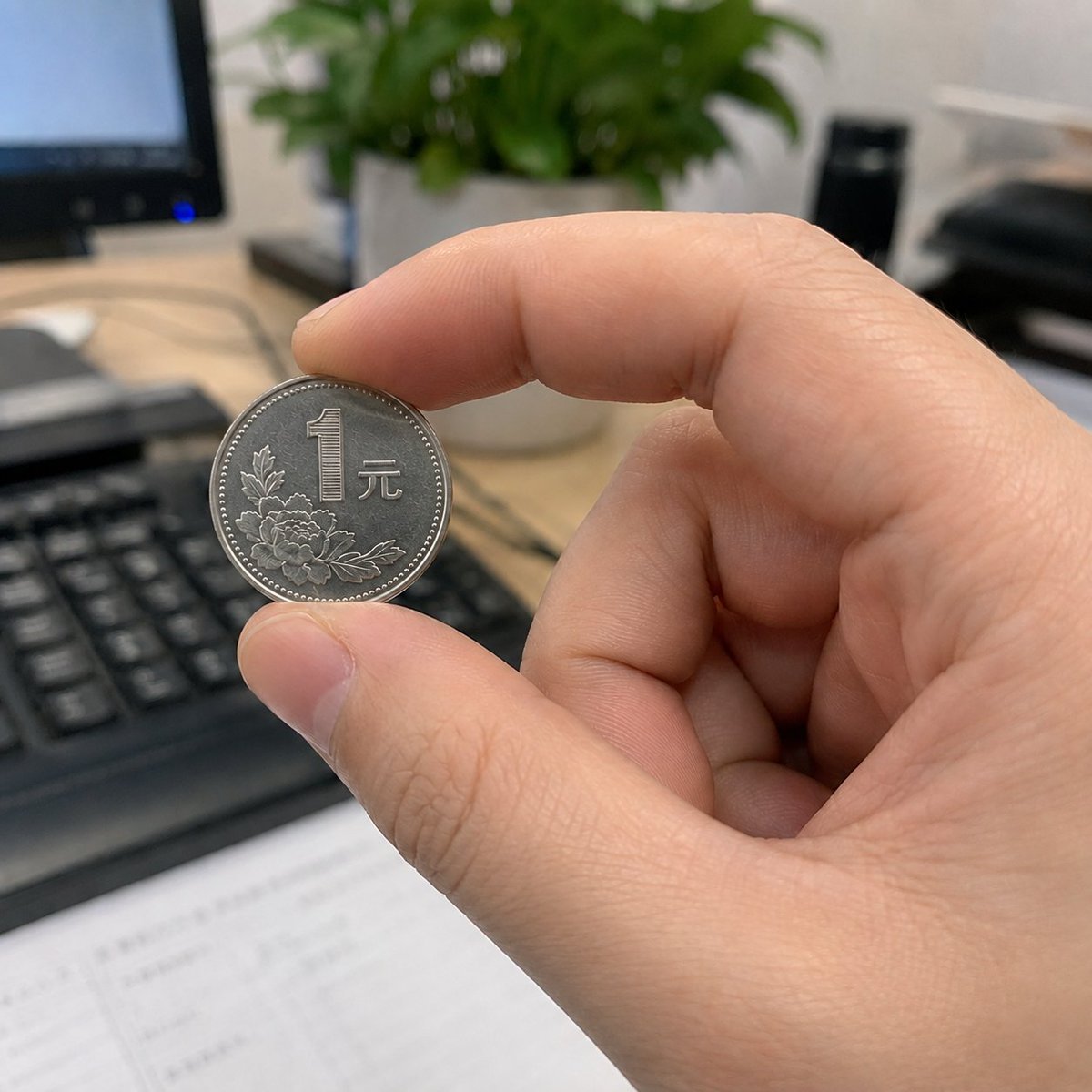 Social Media Post - Hand Pinching One-Yuan Coin — output 1