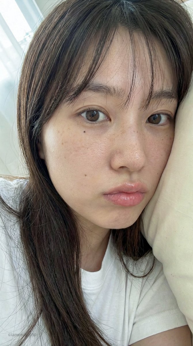 Extreme Close-Up Portrait of a Woman Sleeping on a Pillow — output 1