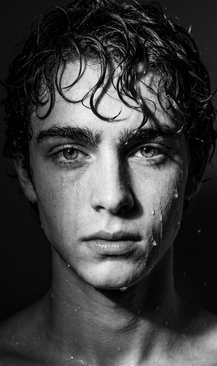 Dramatic Black and White Wet Portrait Prompt — output 1