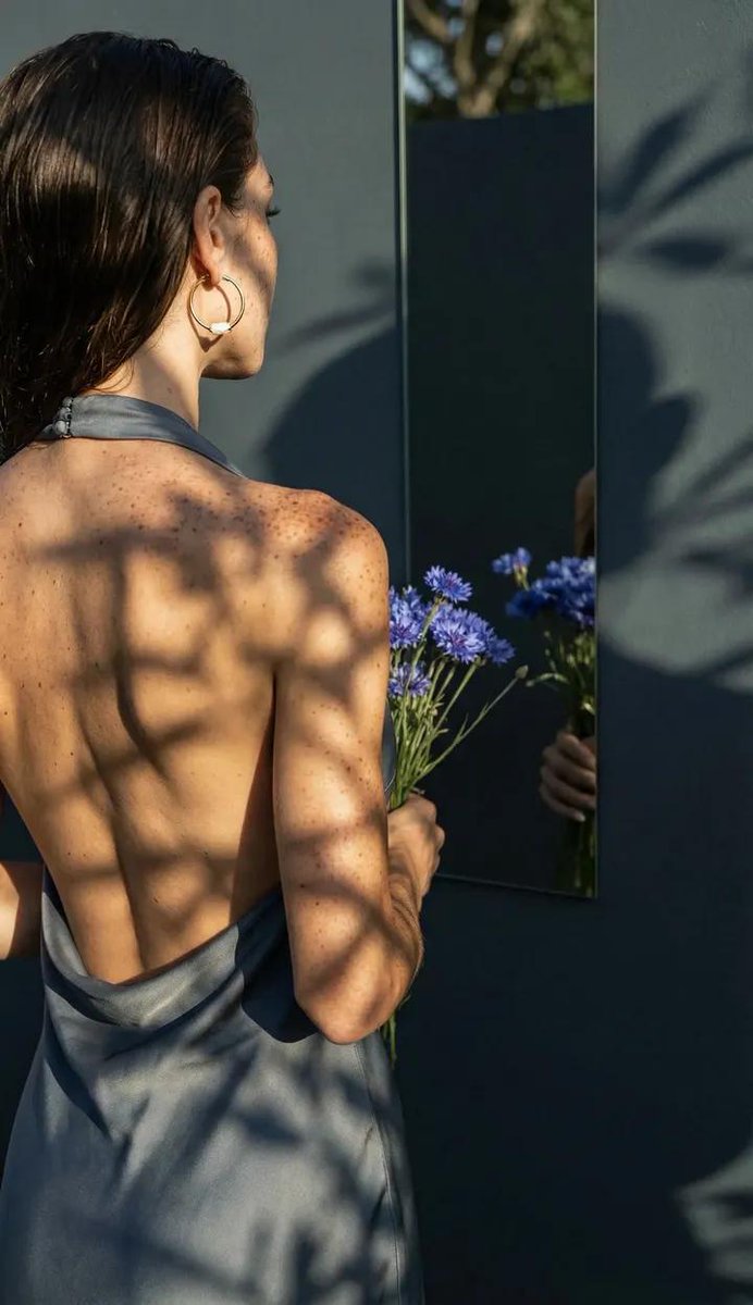 Poetic Realism Portrait with Light and Shadow Interplay — output 1