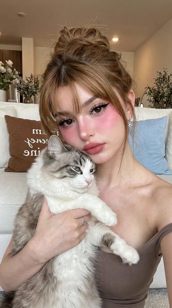 Profile / Avatar - Candid Indoor Portrait with Cat — output 1