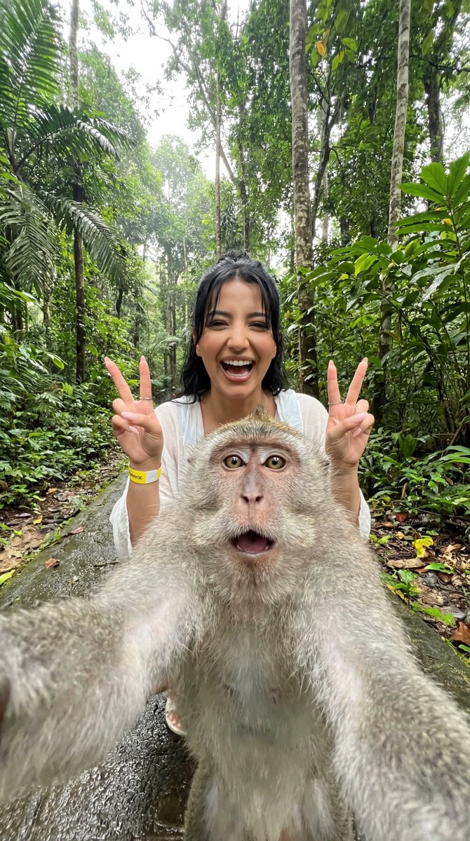 Humorous Monkey Selfie in Tropical Jungle — output 1