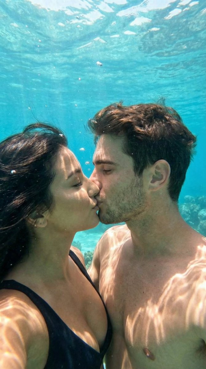 Social Media Post - Underwater Cinematic Couple Kiss with Identity Preservation — output 1