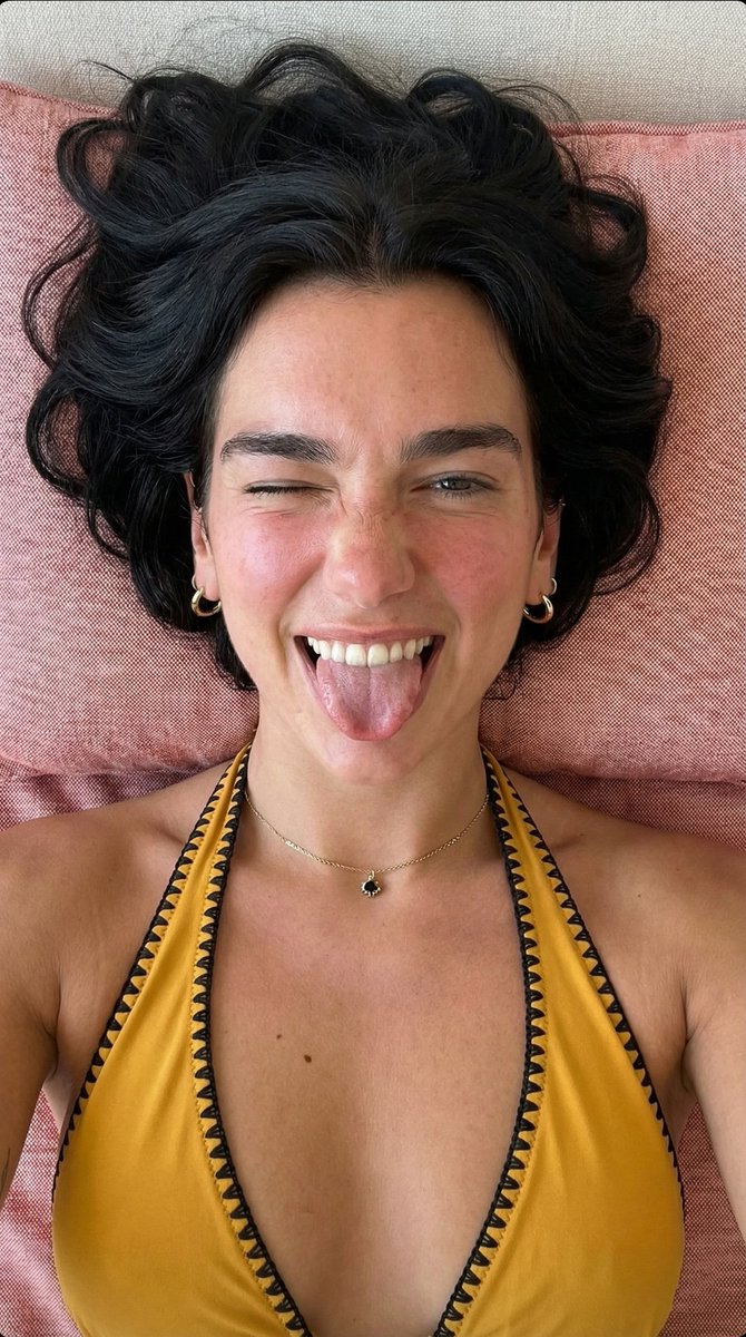 Profile / Avatar - Playful Overhead Portrait Prompt (Winking and Tongue Out) — output 1