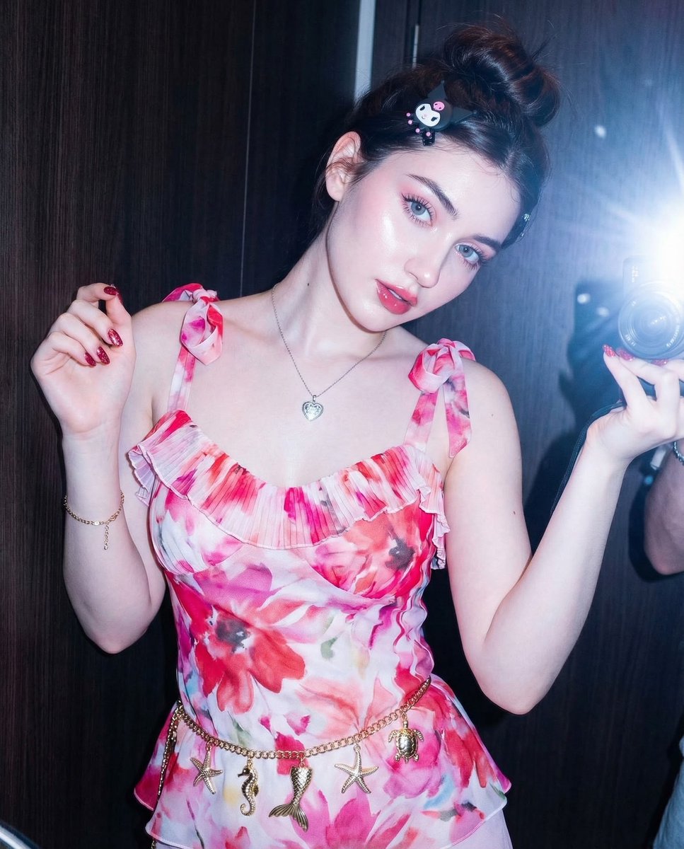Hyper-realistic portrait of woman in floral dress prompt (partial) — output 1