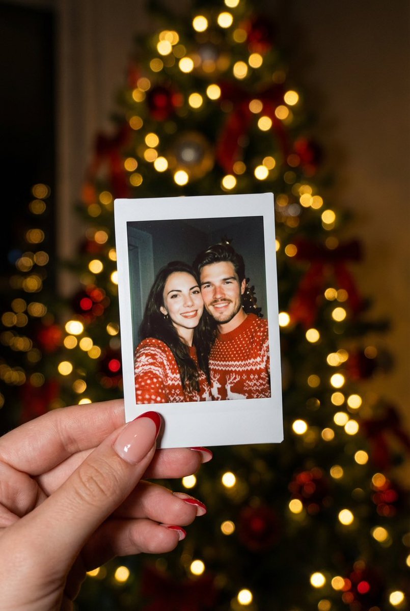 Photorealistic Polaroid Couple Selfie with Christmas Bokeh — output 1