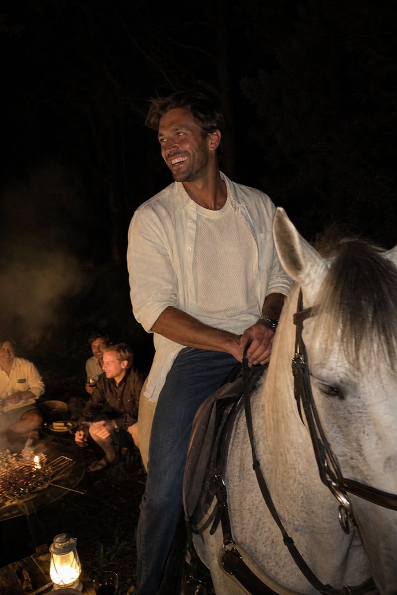 Social Media Post - Candid Night Horseback Campfire Photo — output 1