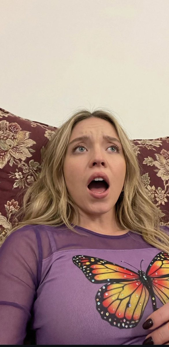 Face Consistency Stress Test Prompt (Shocked Expression, Low Angle) — output 1