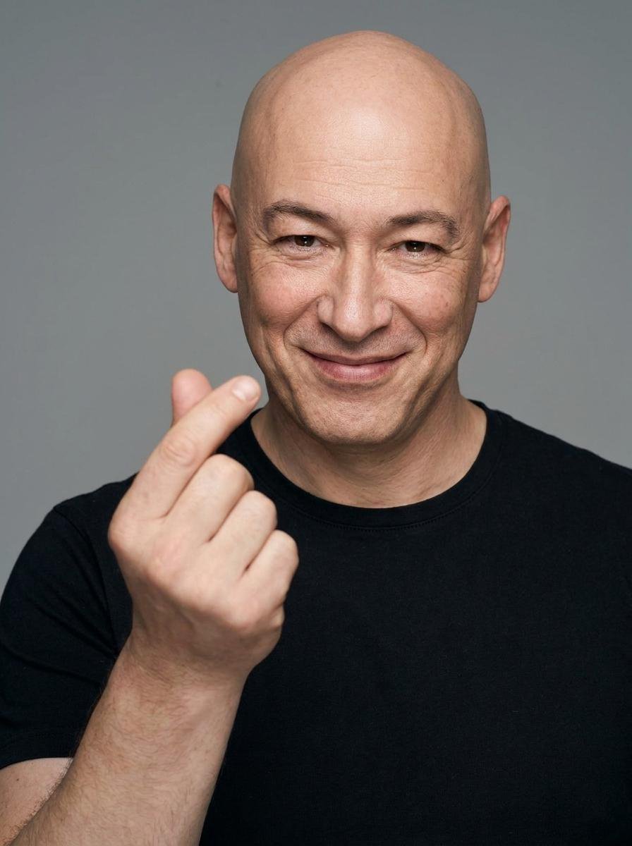 Profile / Avatar - Studio Portrait with Finger Heart Gesture — output 1