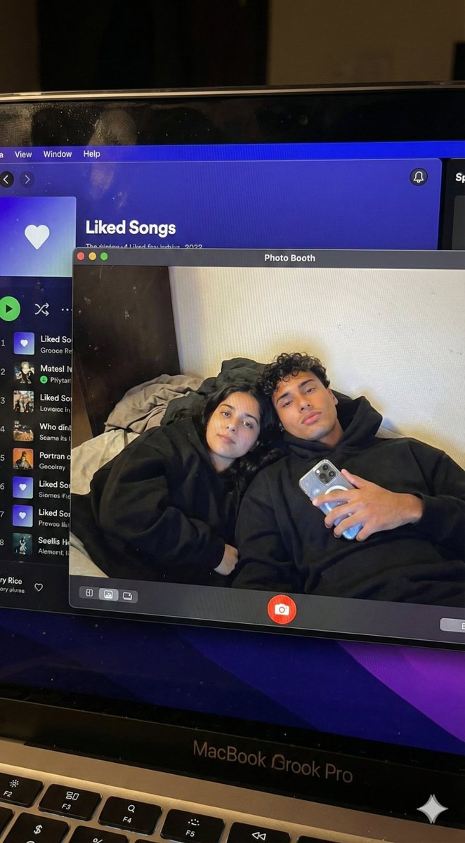 Couple MacBook screen selfie simulation prompt — output 1