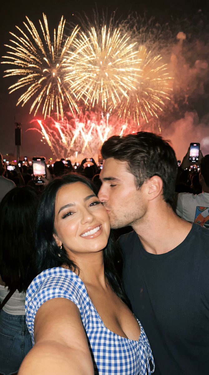 Social Media Post - Photoreal Candid Fireworks Couple Selfie Prompt — output 1