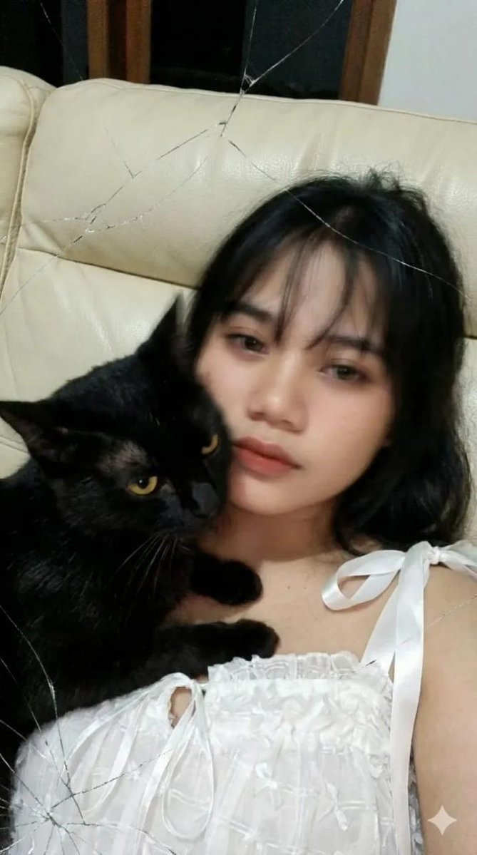 Profile / Avatar - Low-Resolution Motion-Blurred Selfie with Cat — output 1