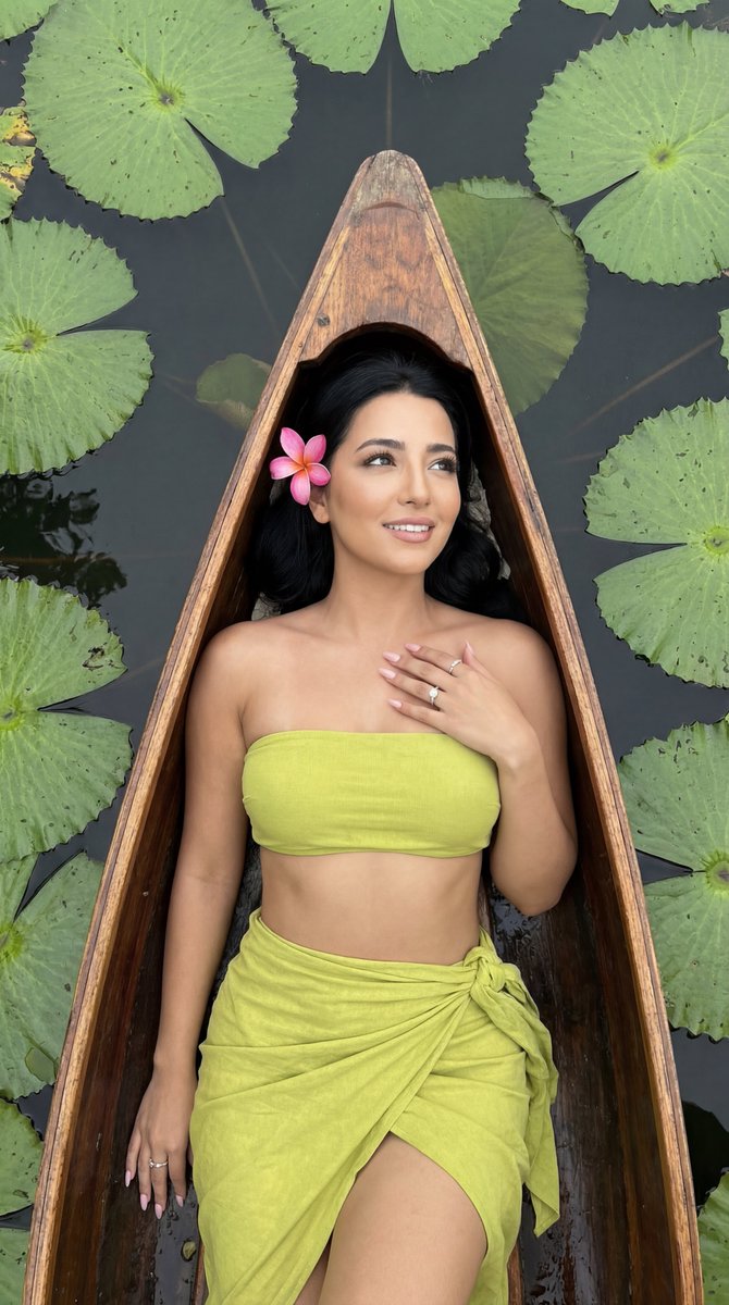 Product Marketing - Photoreal Top-Down Fashion Editorial on a Boat with Lily Pads — output 1