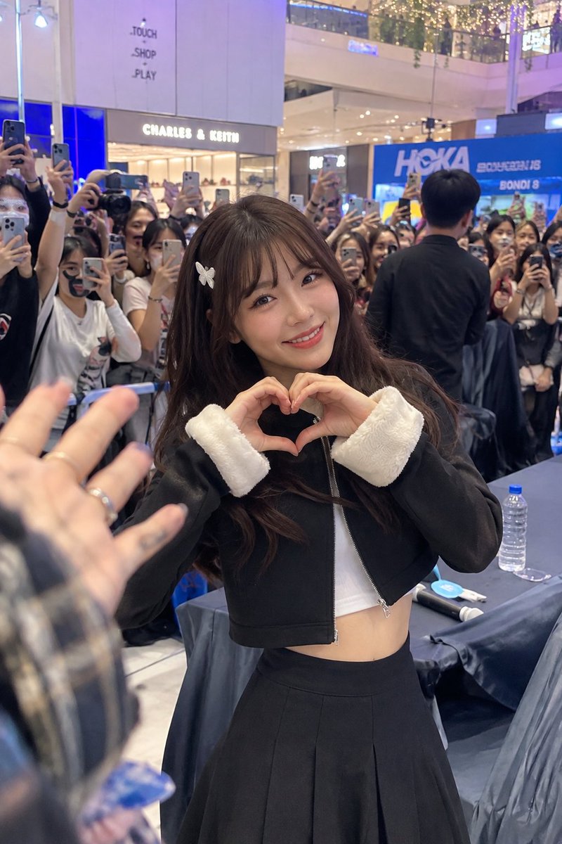 Social Media Post - Indoor Fan Event Candid Portrait — output 1